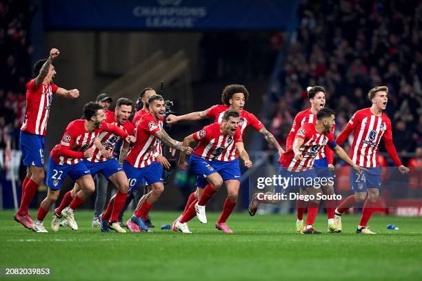 Players of Atletico de Madrid celebrates victory after the penalty round during the UEFA Champions League 2023/24 round of 16 second leg match...