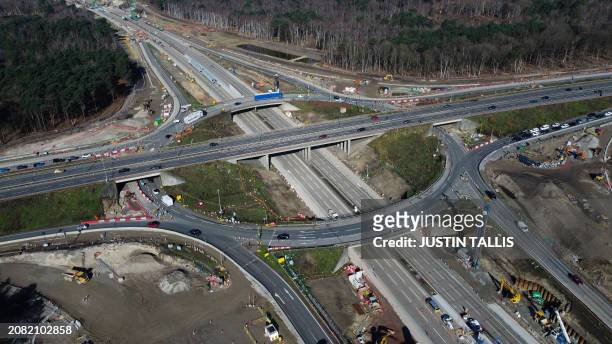 An overhead view shows work ongoing at Junction 10 of the London orbital motorway the M25 on March 16 as the motorway sees it's first total closure...