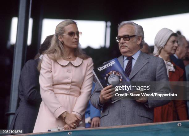 Princess Michael of Kent and Prince Rainier III of Monaco watching a tennis match during the Wimbledon Championships at the All England Lawn Tennis...