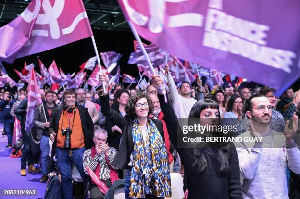 French leftist La France Insoumise party's supporters wave during the "Union Populaire Convention", a meeting to launch the French leftist La France...