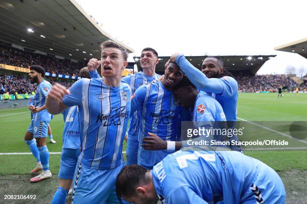Haji Wright of Coventry City celebrates with his teammates after scoring their 3rd goal during the Emirates FA Cup Quarter-final match between...