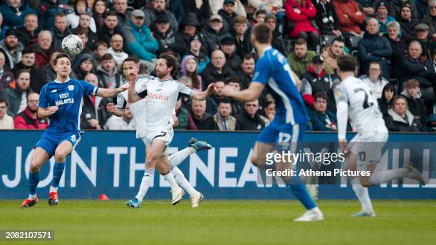 Ryan Wintle of Cardiff City challenged by Joe Allen of Swansea City during the Sky Bet Championship match between Swansea City and Cardiff City at...