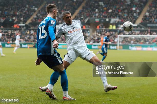 David Turnbull of Cardiff City and Nathan Wood of Swansea City in action during the Sky Bet Championship match between Swansea City and Cardiff City...