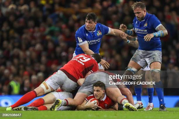 Wales' scrum-half Keiran Hardy fights for the ball during the Six Nations international rugby union match between Wales and Italy at the Principality...