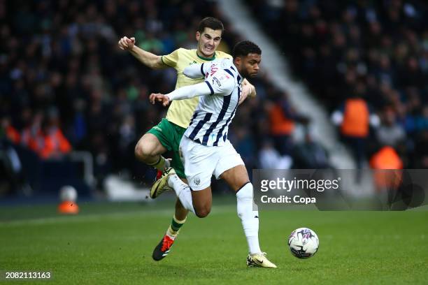 Darnell Furlong of West Bromwich Albion battles for possession with Anis Mehmeti of Bristol City during the Sky Bet Championship match between West...