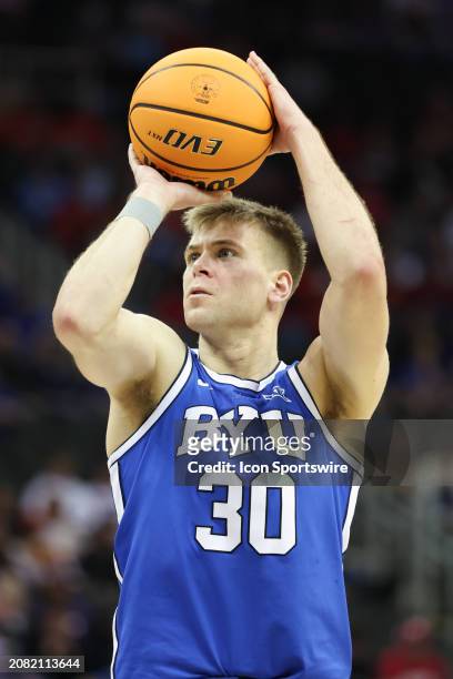 Brigham Young Cougars guard Dallin Hall shoots a free throw in the first half of a Big 12 tournament quarterfinal game between the Brigham Young...