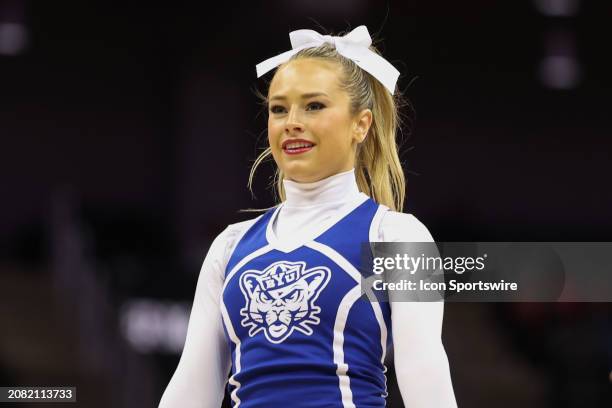 Brigham Young Cougars cheerleader in the first half of a Big 12 tournament quarterfinal game between the Brigham Young Cougars and Texas Tech Red...