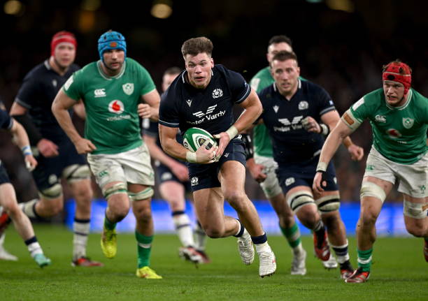 Dublin , Ireland - 16 March 2024; Huw Jones of Scotland on his way to scoring his side's first try during the Guinness Six Nations Rugby Championship...
