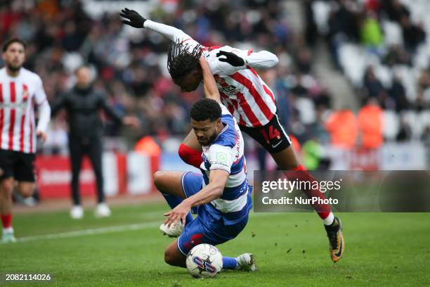 Jake Clarke-Salter is pulling down Sunderland's Romaine Mundle during the Sky Bet Championship match between Sunderland and Queens Park Rangers at...