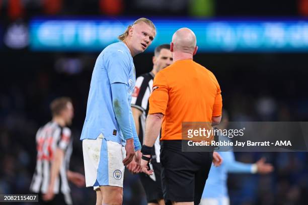 Erling Haaland of Manchester City complains to Referee Simon Hooper during the Emirates FA Cup Quarter Final match between Manchester City and...