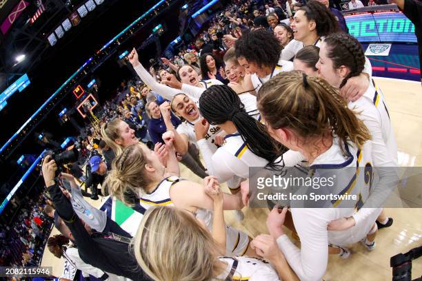 The Kent State Golden Flashes celebrate after winning the Mid-American Conference Women's Basketball Championship following the MAC Women's...