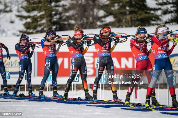 Selina Grotian of Germany and Vanessa Voigt of Germany at the last shooting during the Women 10 km Pursuit at the BMW IBU World Cup Biathlon on March...