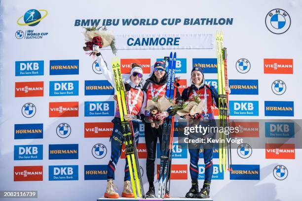 Second placed Lou Jeanmonnot of France, first placed Lisa Vittozzi of Italy and third placed Justine Braisaz-Bouchet of France celebrates during the...