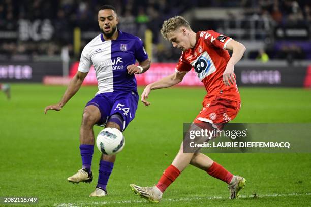 Anderlecht's Killian Sardella and Kortrijk's Dion De Neve fight for the ball during a soccer match between RSC Anderlecht and KV Kortrijk, Saturday...