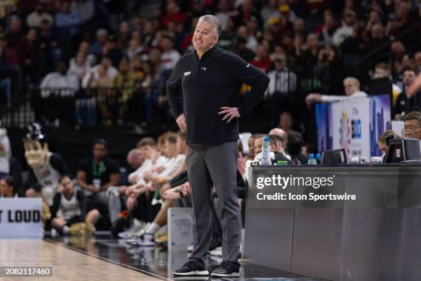 Purdue Boilermakers head coach Matt Painter looks on during the second half of a Big Ten Men's Basketball Tournament semi finals game between the...