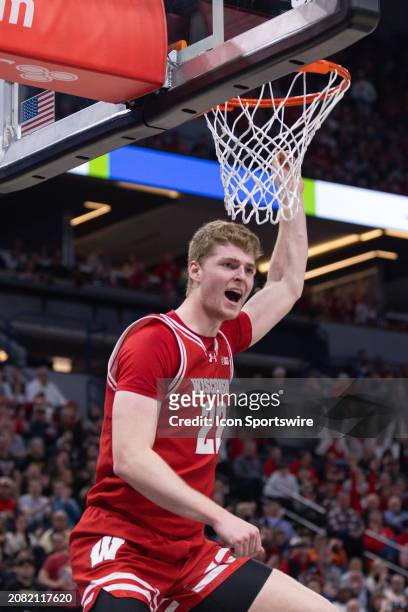 Wisconsin Badgers forward Steven Crowl dunks the ball over Purdue Boilermakers guard Braden Smith during the second half of a Big Ten Men's...