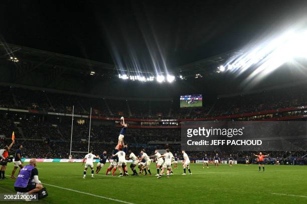 France's lock Thibaud Flament catches the ball in a line out during the Six Nations international rugby union match between France and England at the...