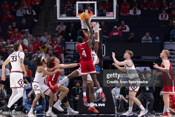 Nebraska Cornhuskers forward Juwan Gary goes up for a shot over Illinois Fighting Illini forward Quincy Guerrier during the second half of the Big...