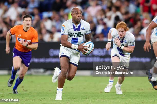 Mark Tele'a of the Blues runs the ball during the Super Rugby Pacific match between Waratahs vs Blues at the Allianz Stadium on March 16, 2024 in...