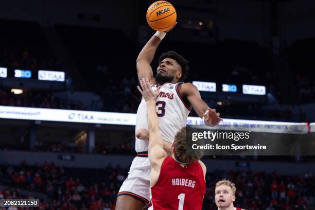 Illinois Fighting Illini forward Quincy Guerrier goes up for a shot over Nebraska Cornhuskers guard Sam Hoiberg during the second half of the Big Ten...