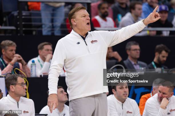 Illinois Fighting Illini head coach Brad Underwood yells out instructions during the second half of the Big Ten Men's Basketball Tournament semi...