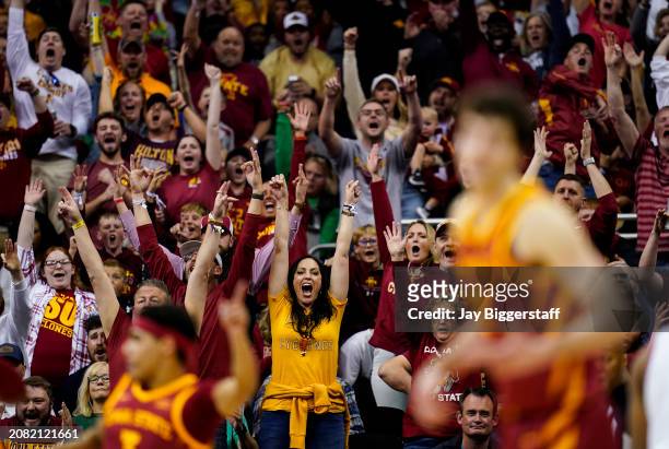 Iowa State Cyclones cheer after a basket by Milan Momcilovic during the first half of the Big 12 Men's Basketball Tournament championship game...