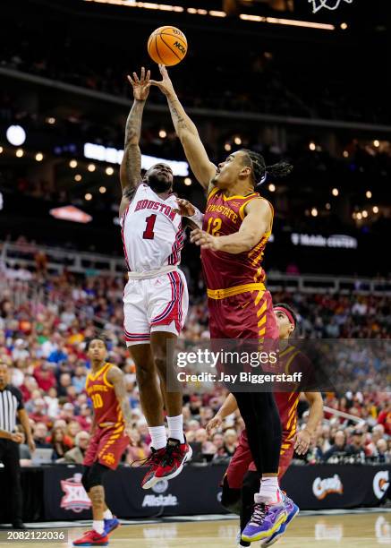 Jamal Shead of the Houston Cougars shoots against Robert Jones of the Iowa State Cyclones during the first half of the Big 12 Men's Basketball...