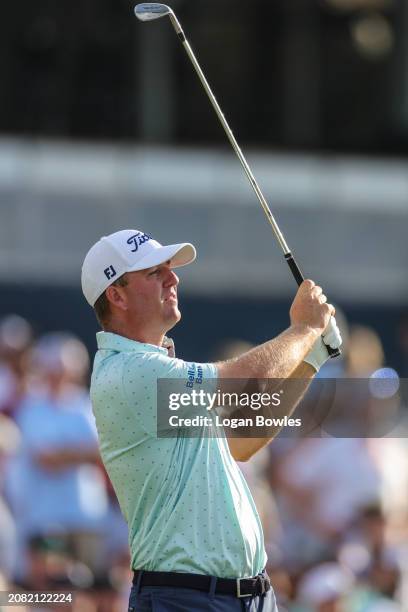 Tom Hoge plays a shot from the 17th tee during the third round of THE PLAYERS Championship at Stadium Course at TPC Sawgrass on March 16, 2024 in...