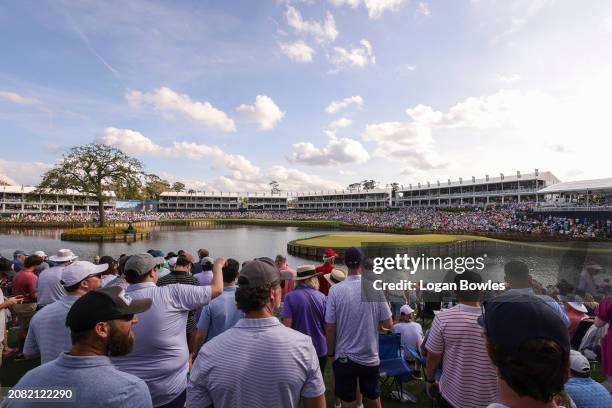 General view of fans is seen as they watch play on the 17th green during the third round of THE PLAYERS Championship at Stadium Course at TPC...