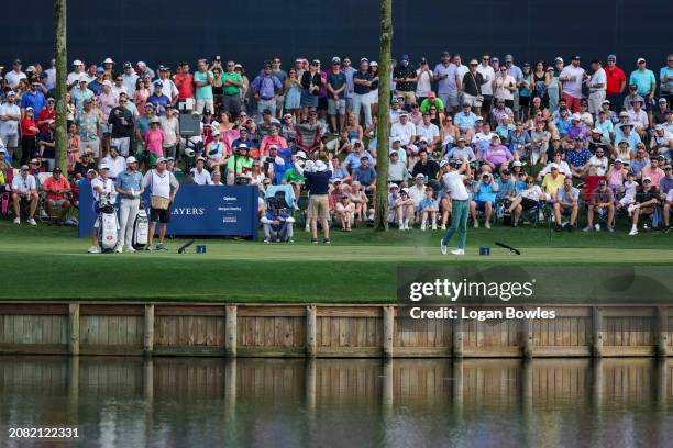 Harris English plays a shot from the 17th tee during the third round of THE PLAYERS Championship at Stadium Course at TPC Sawgrass on March 16, 2024...