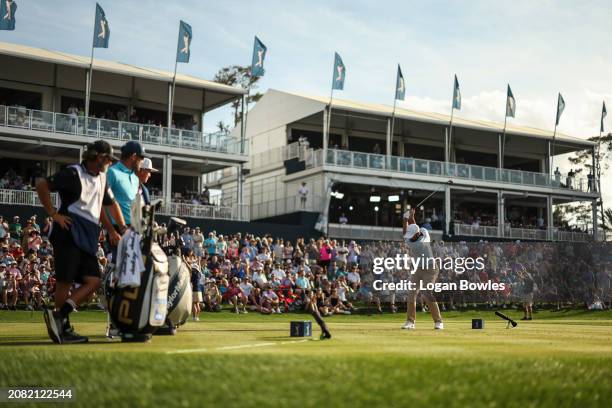Scottie Scheffler plays a shot on the 17th tee during the third round of THE PLAYERS Championship at Stadium Course at TPC Sawgrass on March 16, 2024...