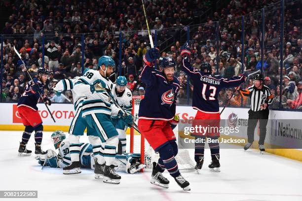 Boone Jenner of the Columbus Blue Jackets reacts after scoring a goal during the first period of a game against the San Jose Sharks at Nationwide...