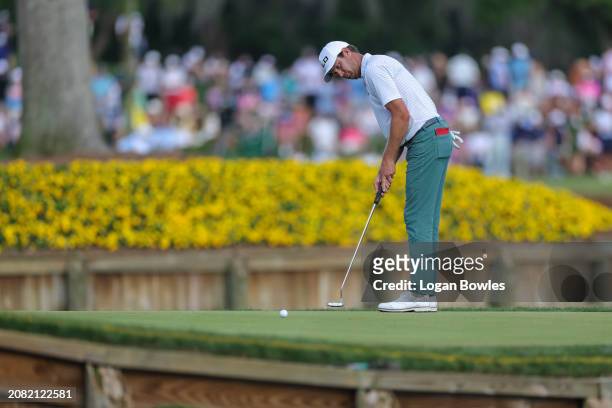 Harris English putts on the 17th green during the third round of THE PLAYERS Championship at Stadium Course at TPC Sawgrass on March 16, 2024 in...