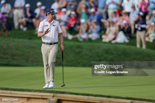 Poston waves on the 16th green during the third round of THE PLAYERS Championship at Stadium Course at TPC Sawgrass on March 16, 2024 in Ponte Vedra...