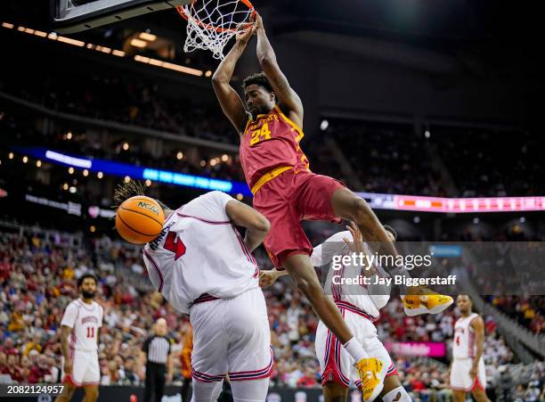 Hason Ward of the Iowa State Cyclones dunks against Ja'Vier Francis of the Houston Cougars during the second half of the Big 12 Men's Basketball...