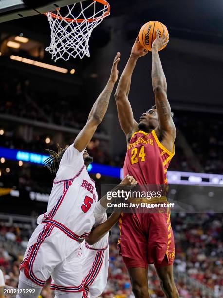 Hason Ward of the Iowa State Cyclones dunks against Ja'Vier Francis of the Houston Cougars during the second half of the Big 12 Men's Basketball...