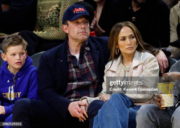 Jennifer Lopez, Ben Affleck and his son Samuel Garner Affleck attend a basketball game between the Los Angeles Lakers and Golden State Warriors at...