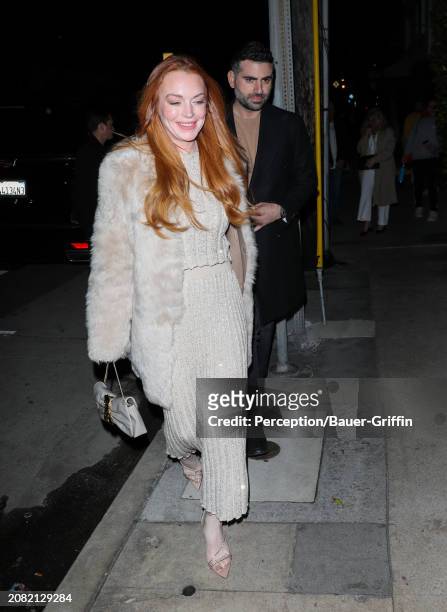 Lindsay Lohan and Bader Shammas are seen arriving to Giorgio Baldi on March 16, 2024 in Santa Monica, California.