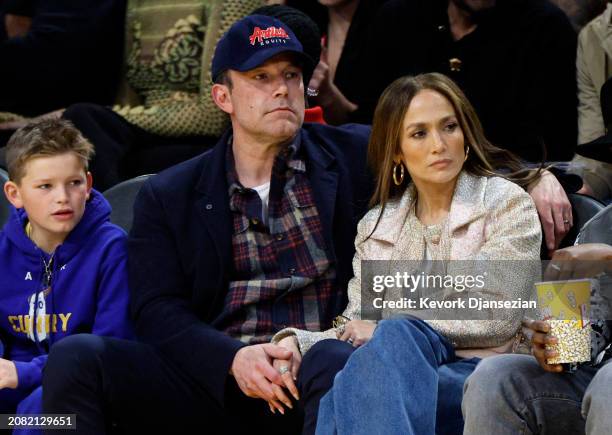Jennifer Lopez, Ben Affleck and his son Samuel Garner Affleck attend a basketball game between the Los Angeles Lakers and Golden State Warriors at...