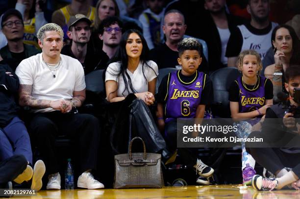 Kim Kardashian and her son Saint West attend a basketball game between the Los Angeles Lakers and Golden State Warriors at Crypto.com Arena on March...