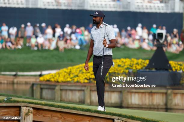 EwPONTE VEDRA BEACH, FL PGA golfer Sahith Theegala reacts to making a putt on the 17th hole during the third round of The Players Championship on...