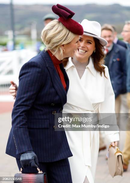 Zara Tindall and Princess Eugenie attend day 2 'Style Wednesday' of the Cheltenham Festival at Cheltenham Racecourse on March 13, 2024 in Cheltenham,...