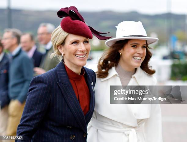 Zara Tindall and Princess Eugenie attend day 2 'Style Wednesday' of the Cheltenham Festival at Cheltenham Racecourse on March 13, 2024 in Cheltenham,...