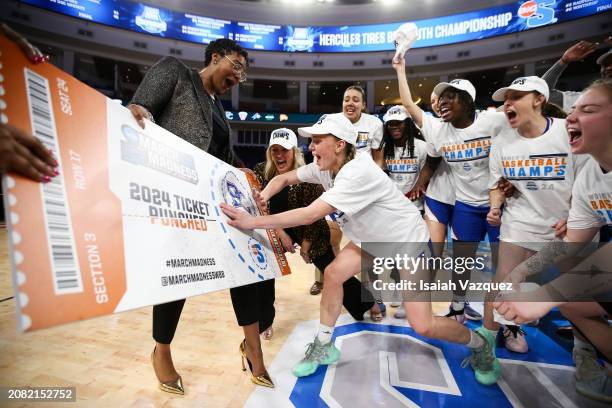 Tilda Sjokvist of the Presbyterian Blue Hose slaps the sticker after winning the Big South Women's Basketball Championship against the Radford...