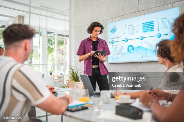 hispanic entrepreneur engaging generation z in data discussion - case studies stock pictures, royalty-free photos & images