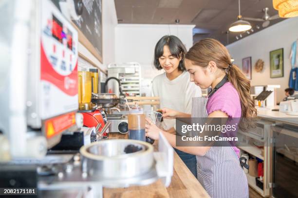Intern Tea Making Intern Making Coffee Photos and Premium High Res Pictures - Getty Images