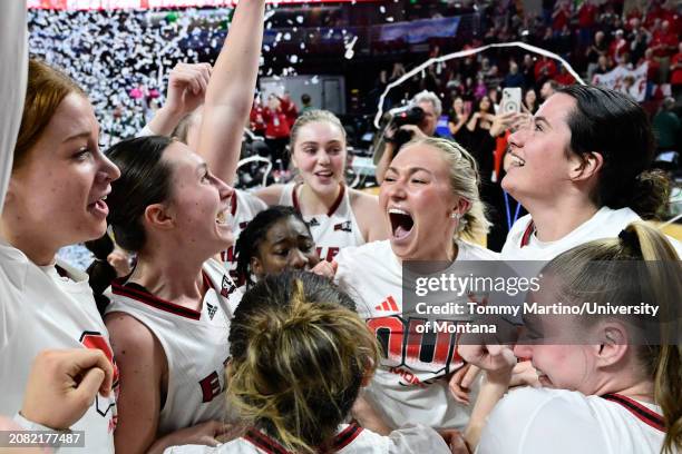 The Eastern Washington Eagles celebrate after beating the Northern Arizona Lumberjacks 73-64 in the Big Sky Basketball Tournament Championship at...