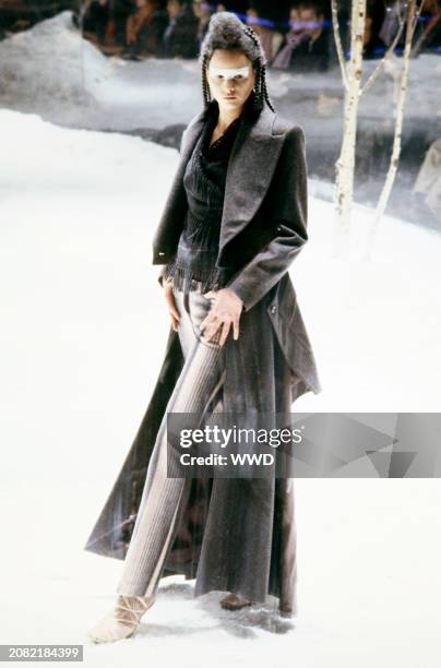 Model Sunniva Stordal Bjorklund walks in the Alexander McQueen Fall 1999 Ready to Wear Runway Show on February 23 in London, England. The show titled...