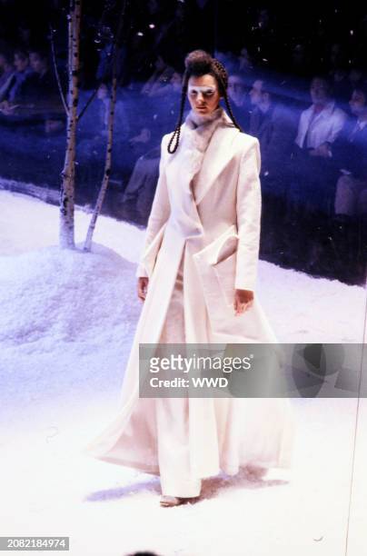 Model Sunniva Stordal Bjorklund walks in the Alexander McQueen Fall 1999 Ready to Wear Runway Show on February 23 in London, England. The show titled...