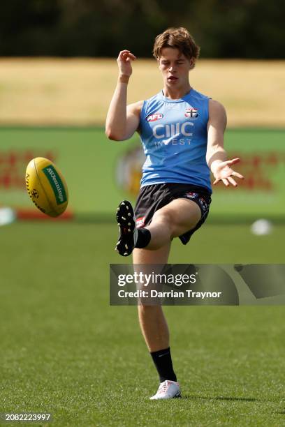 Mattaes Phillipou of the Saints kicks the ball during a St Kilda Saints AFL training session at RSEA Park on March 14, 2024 in Melbourne, Australia.